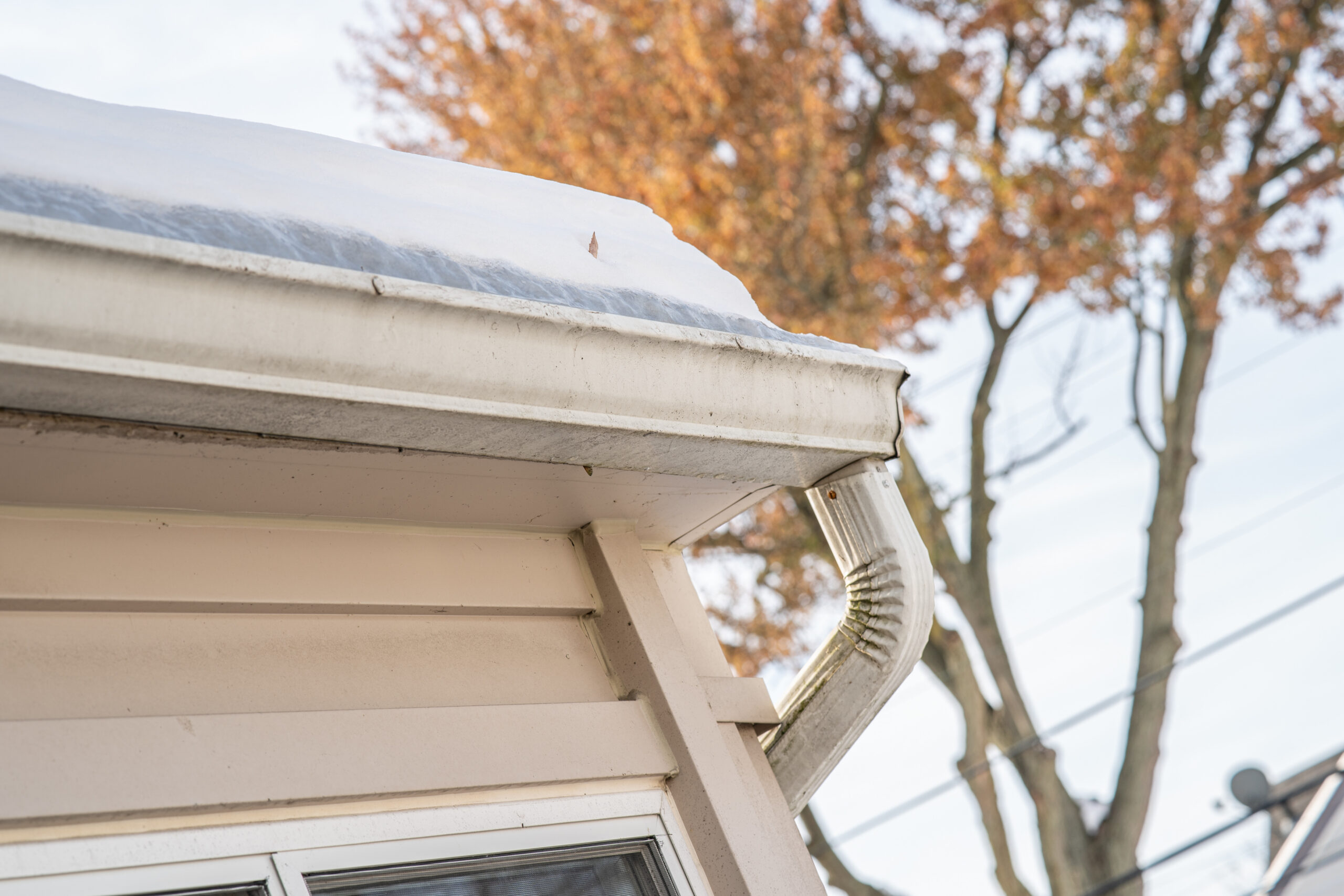 white gutters installed on a home